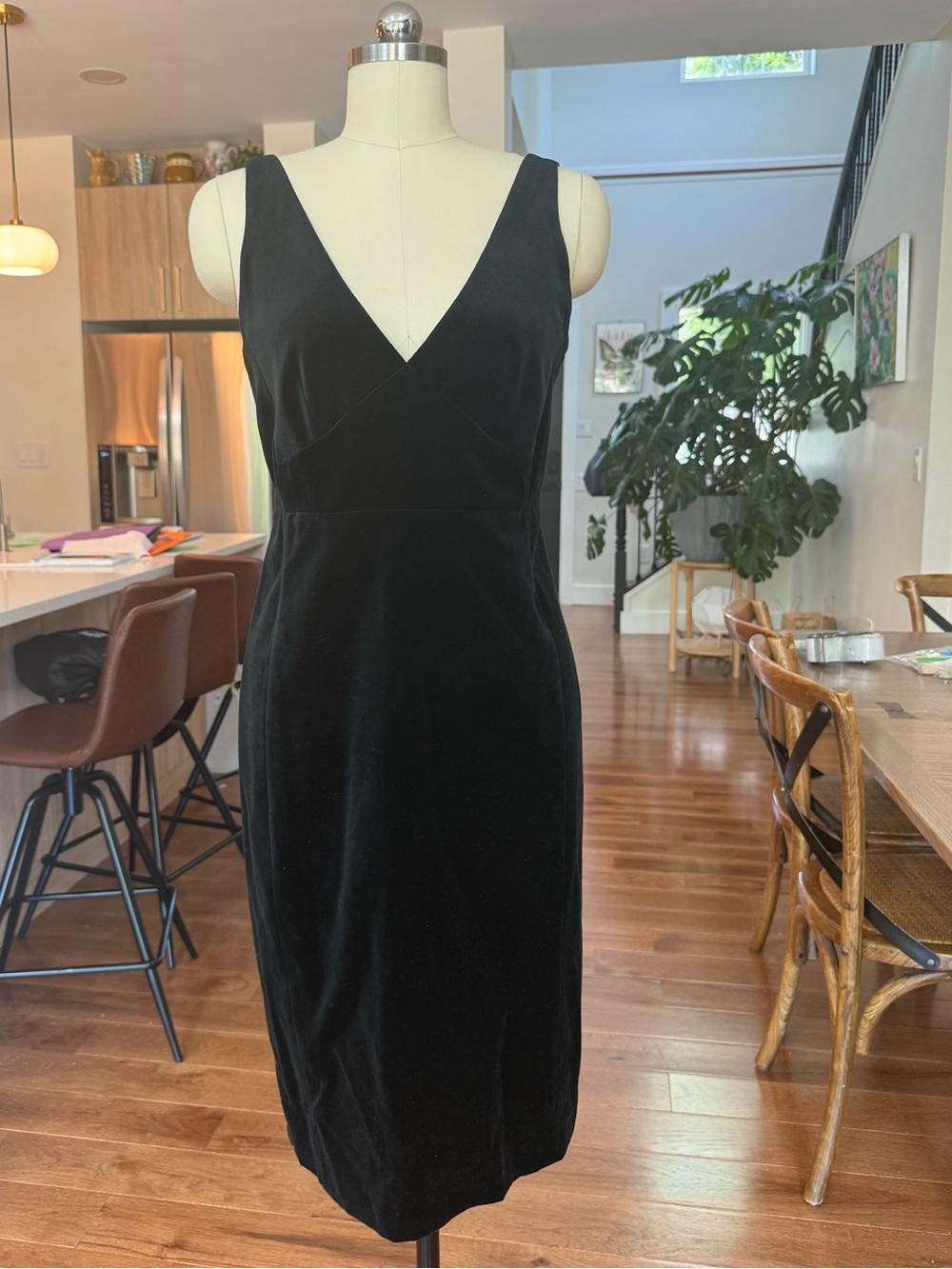 J.Crew black velvet midi dress with deep v-neckline and back zipper. Size: 10